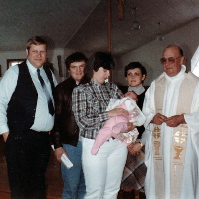 Kristine's baptism John adn Donna Doiron with Caorl and Don Evans and Father Van de Van