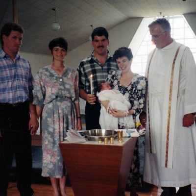 May 1994 Heather & Rob Moffat baptizing Amy Marie god parents Monica & Scott Simpson , Father Pendergast