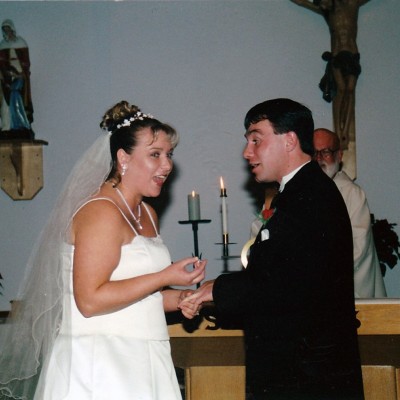 Suzanne & Corey McCabe with Father Leo Trainor