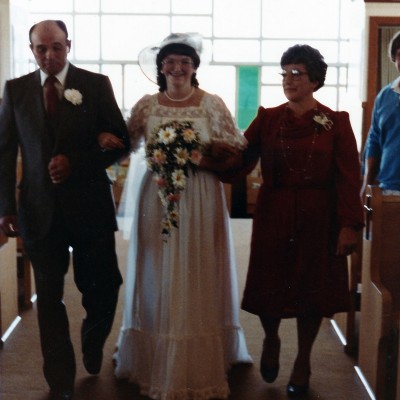 1984 Sept 24 Ivan and Marie walking Claudette down the aisle